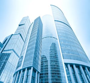 perspective view to glass high-rise skyscrapers of Moscow city business center at night